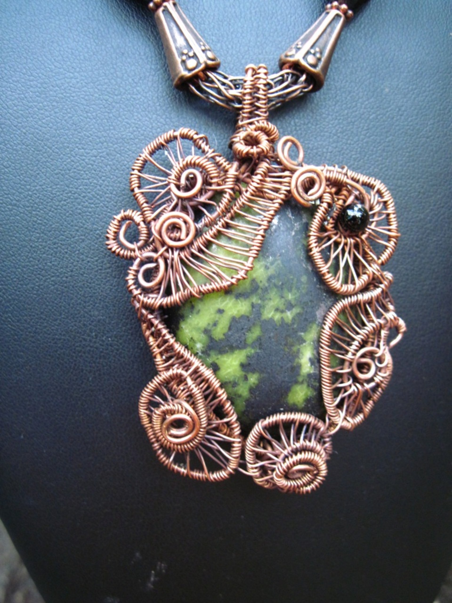 Green and Black Epidote Cabochon copper wire weave pendant with onyx and viking