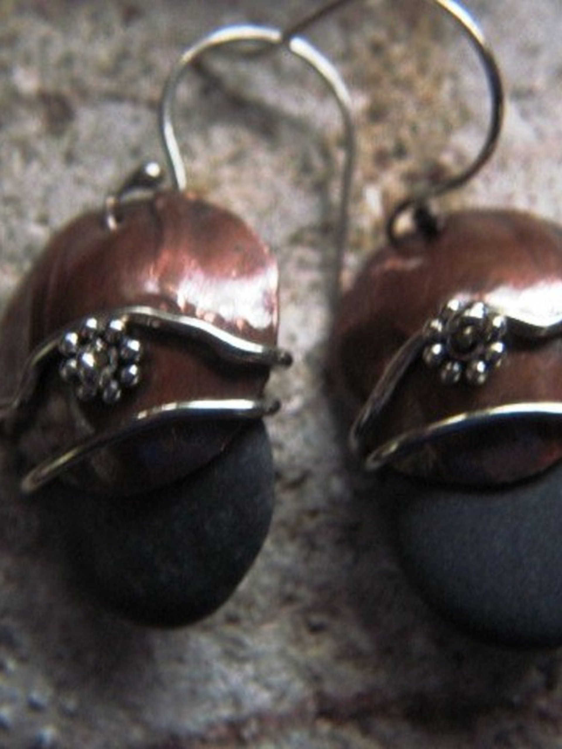 Natural beach stone and copper Om rock earrings