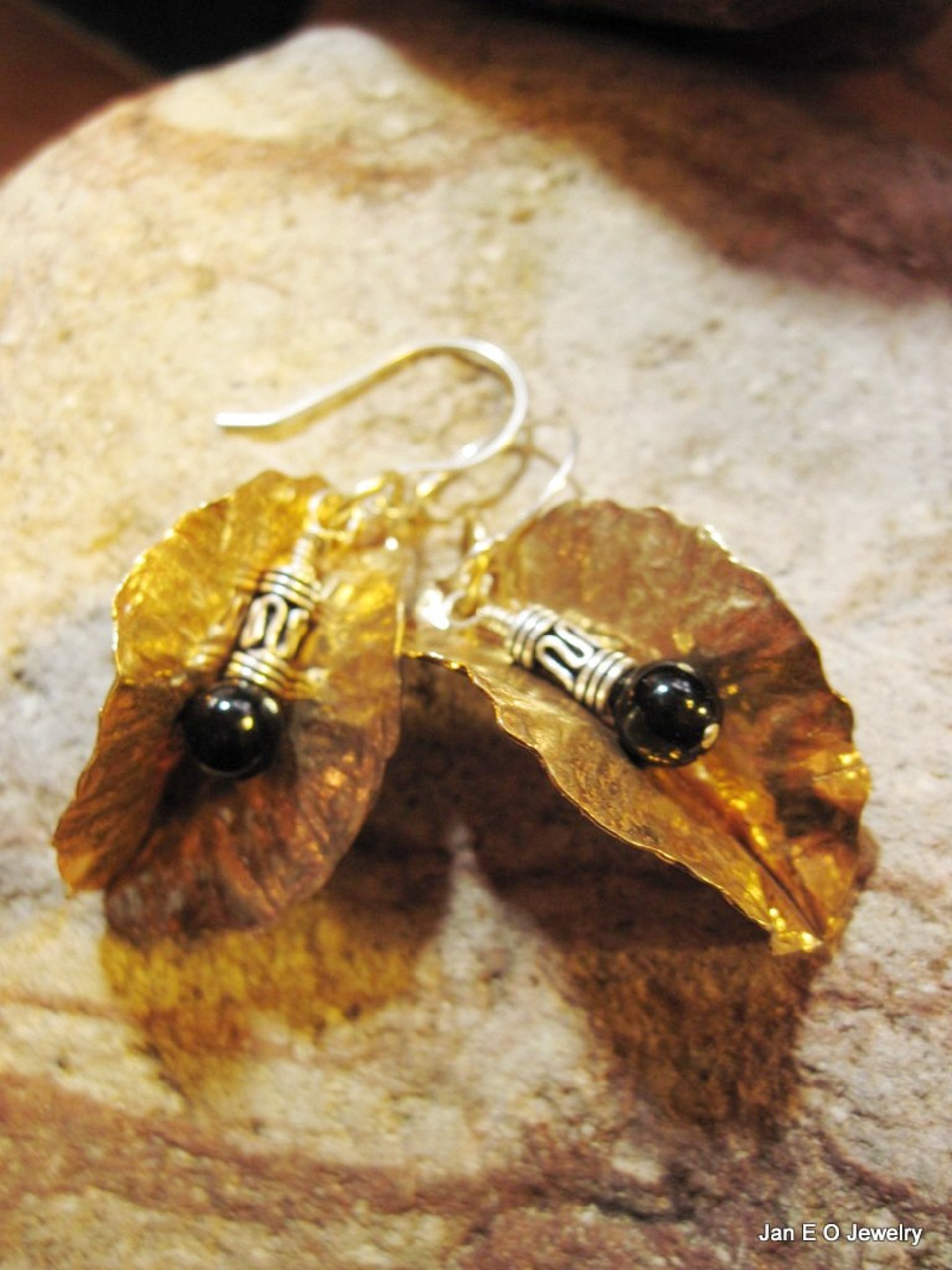 Tribal fold form bronze leaf earrings with sterling and black onyx