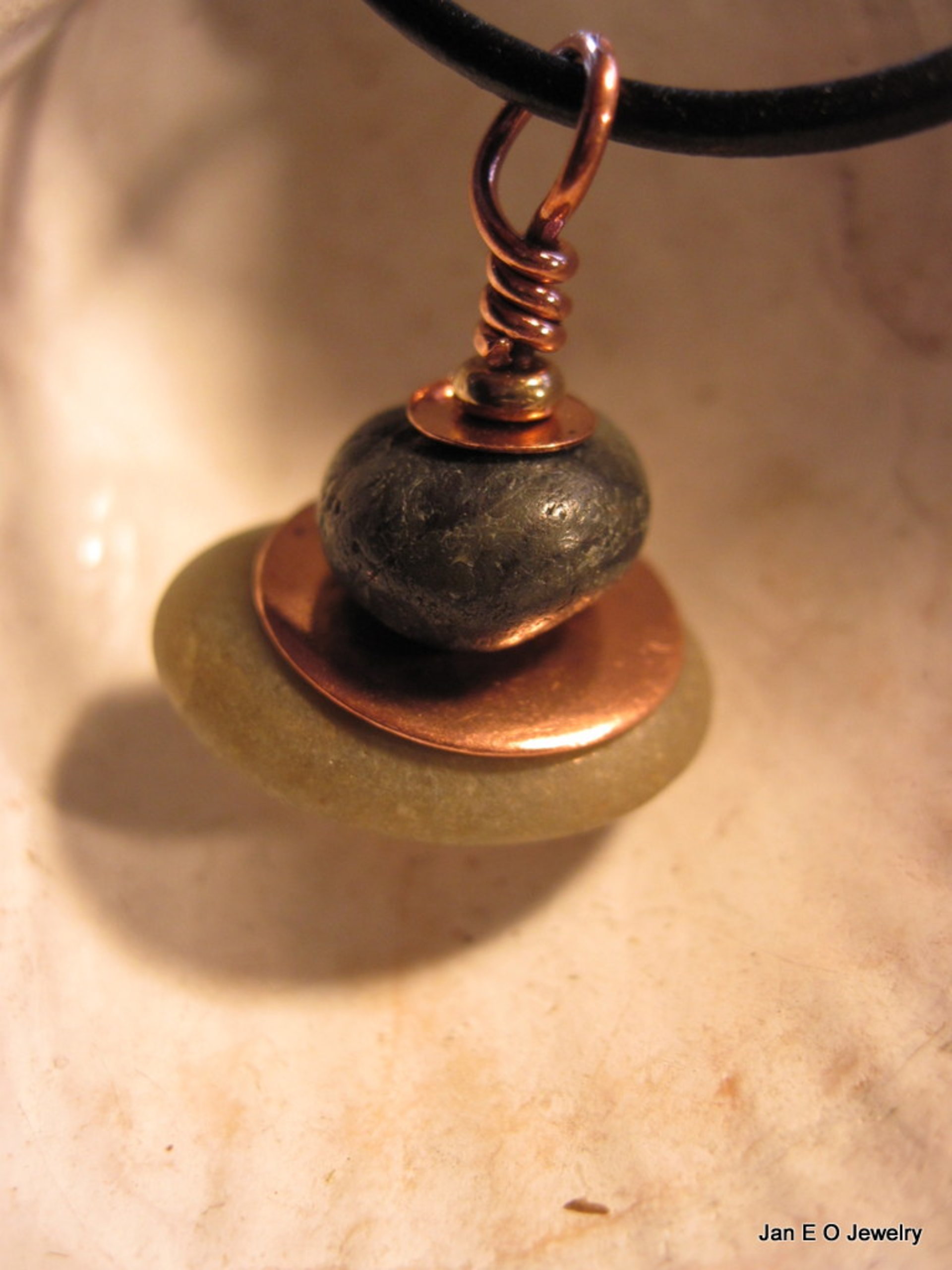 Om rock cairn stacked stone beach rock pendant with copper