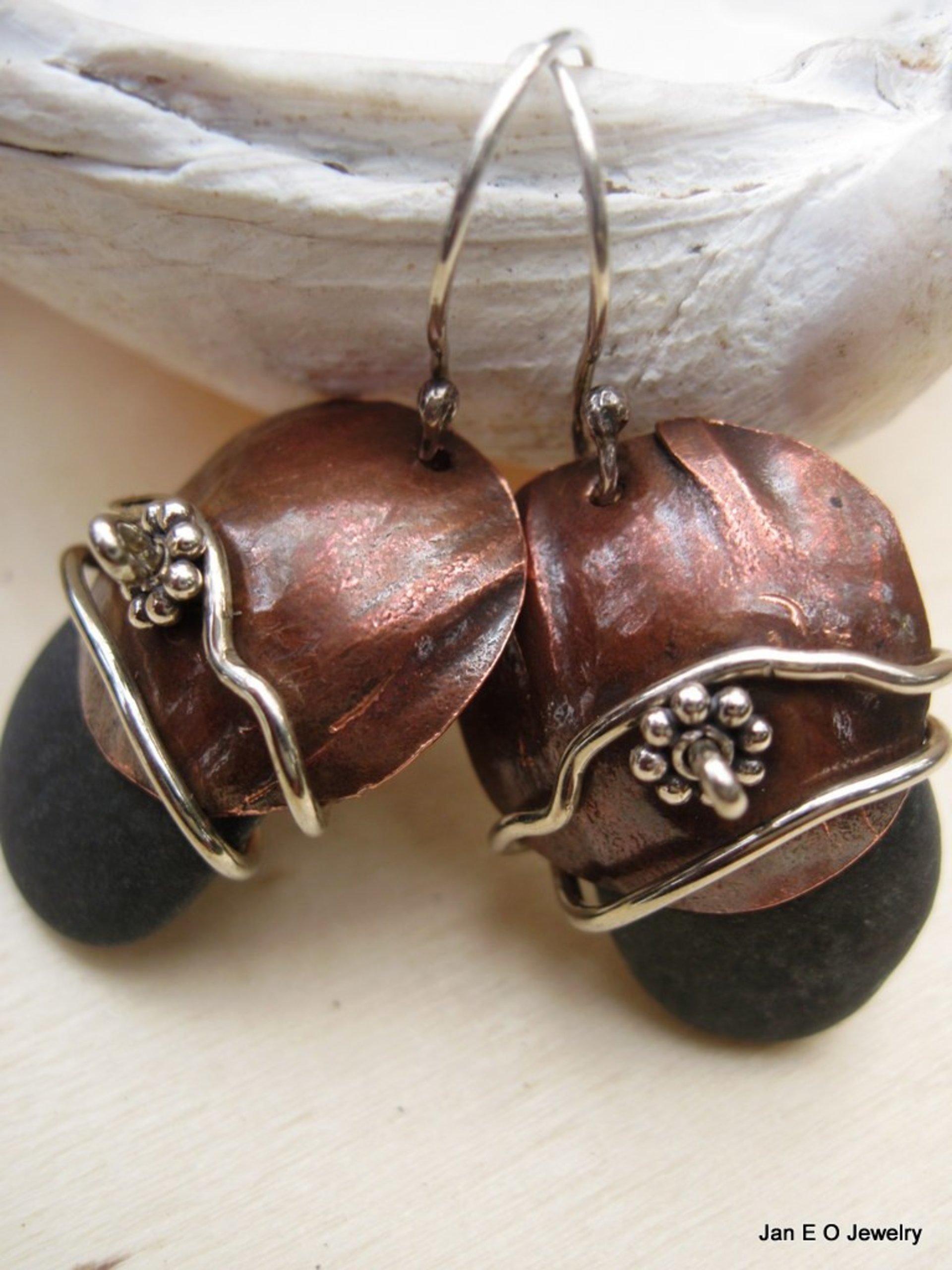 Natural beach stone and copper Om rock earrings