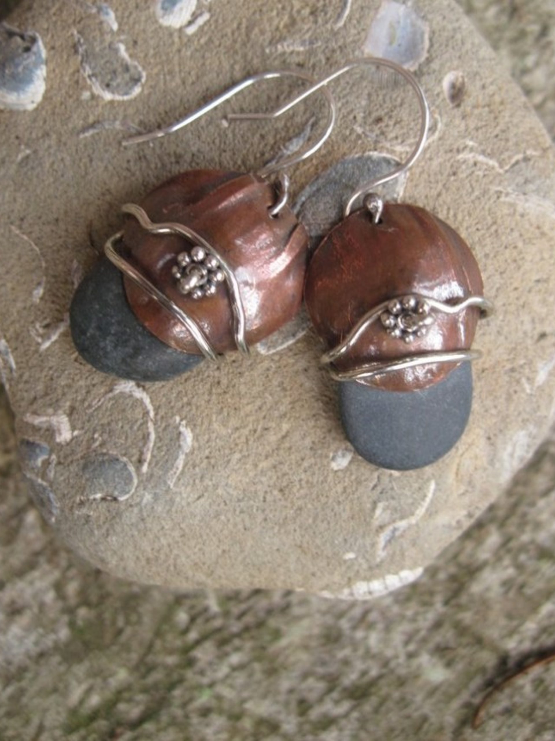 Natural beach stone and copper Om rock earrings