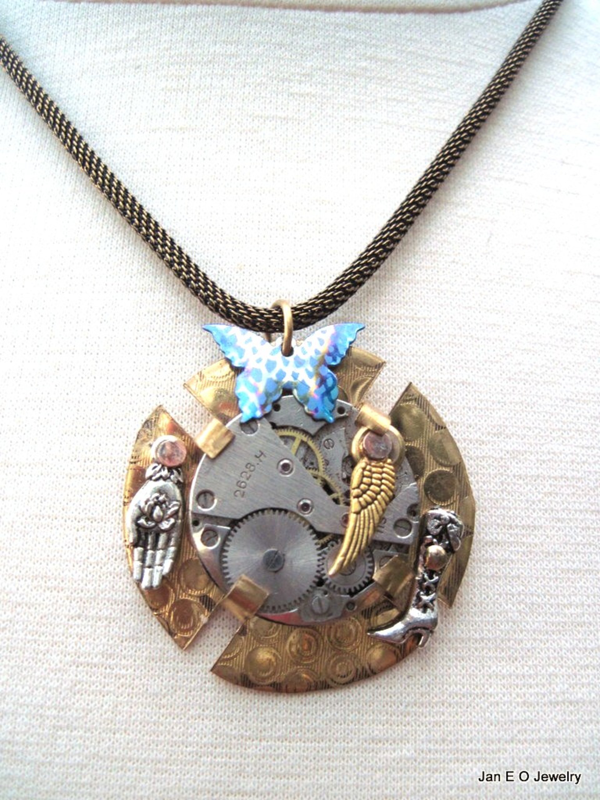 Steampunk mixed metal watchwork brass pendant