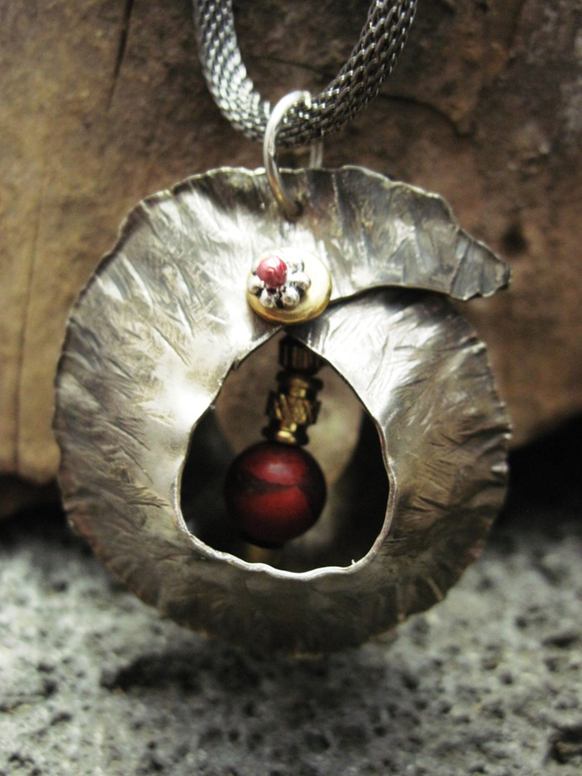 Fold form jasper gemstone and German silver cocoon pendant