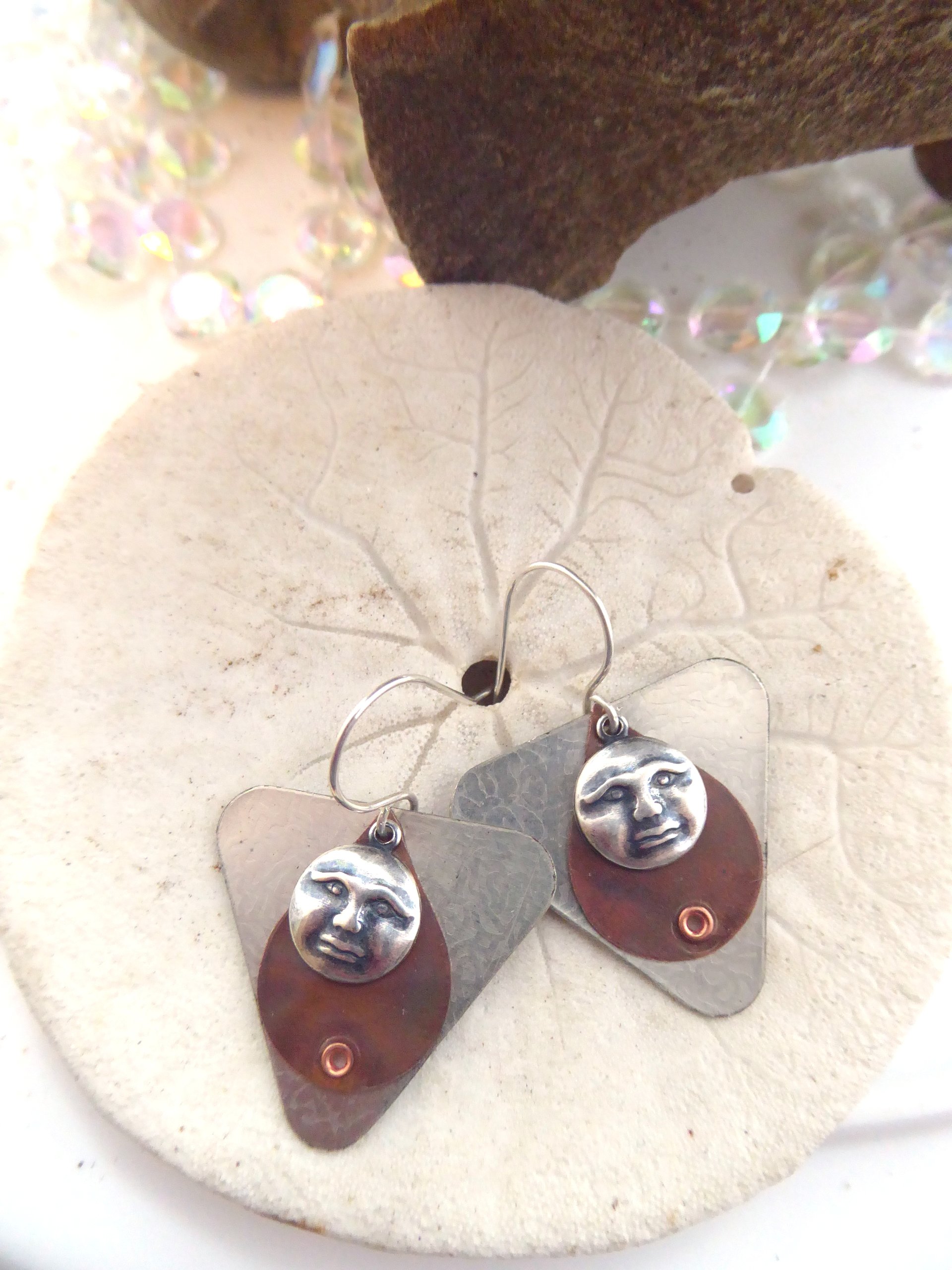 Mixed metal moon face dangle earrings copper and German silver