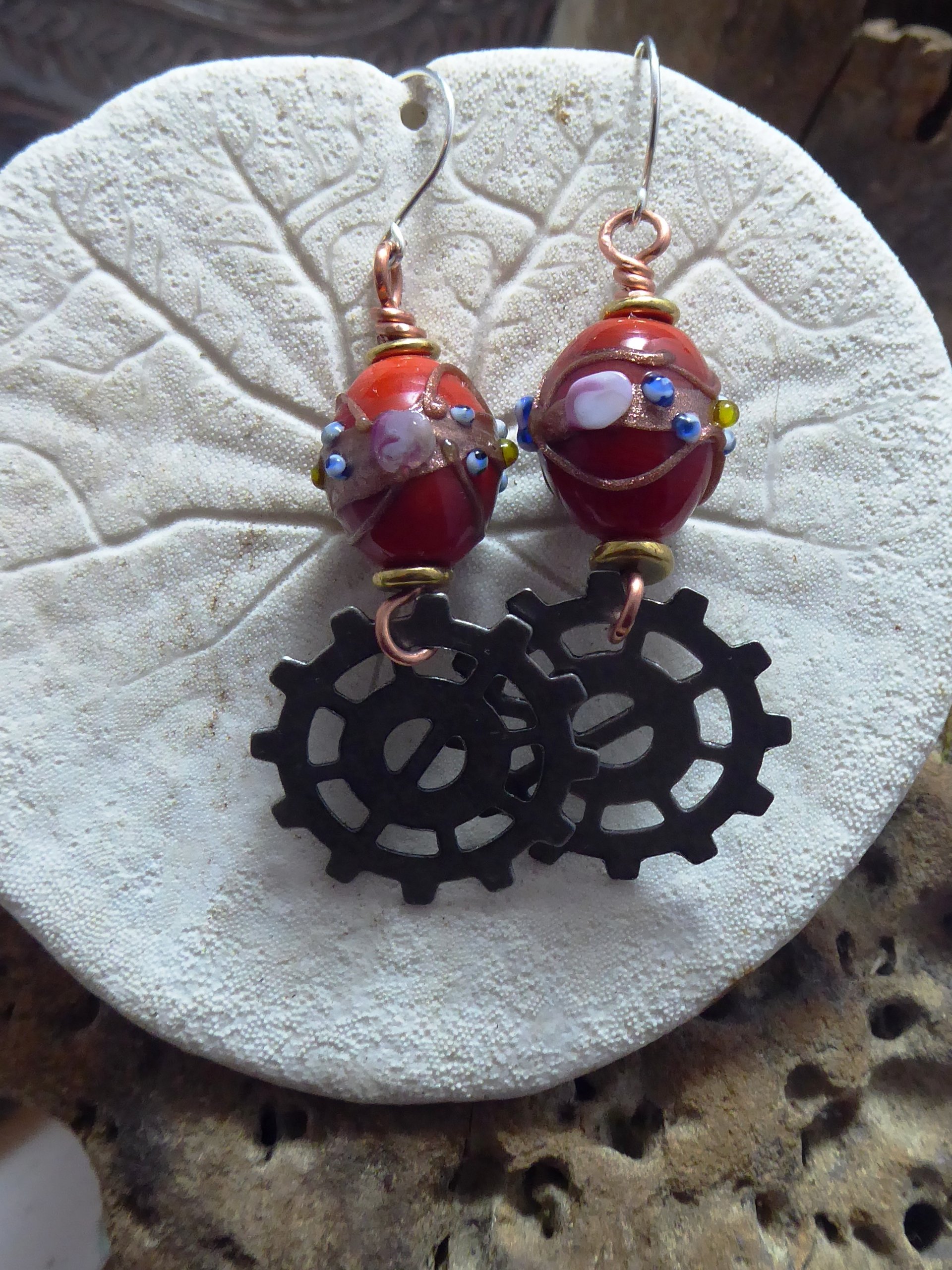 Geared up steampunk orange lampwork dangle earrings