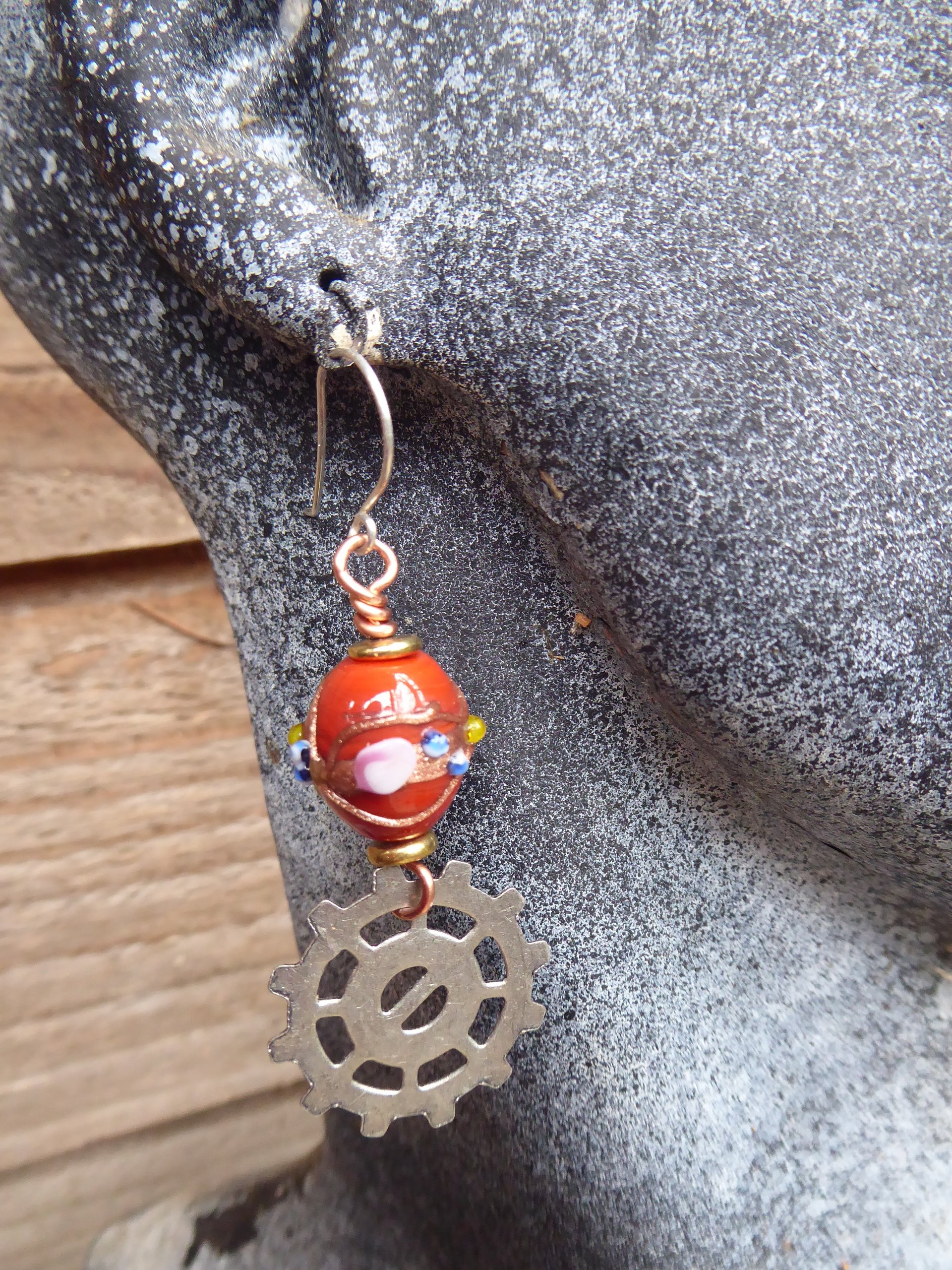 Geared up steampunk orange lampwork dangle earrings