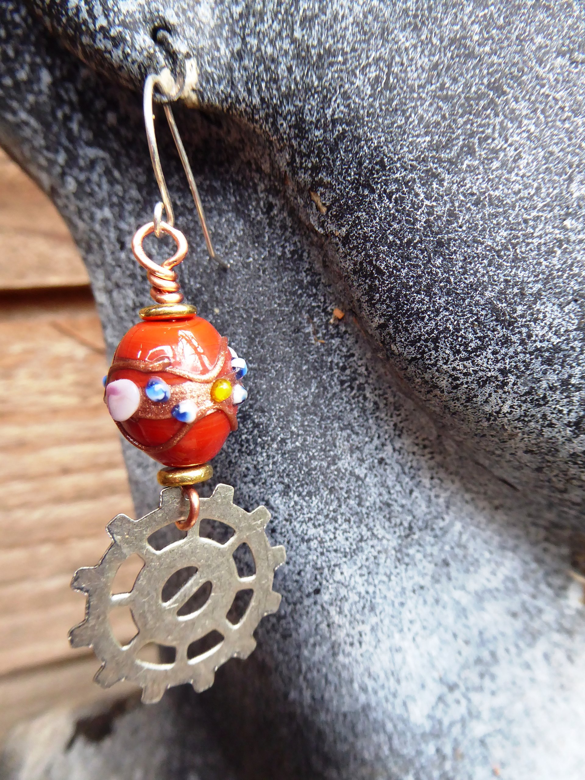 Geared up steampunk orange lampwork dangle earrings