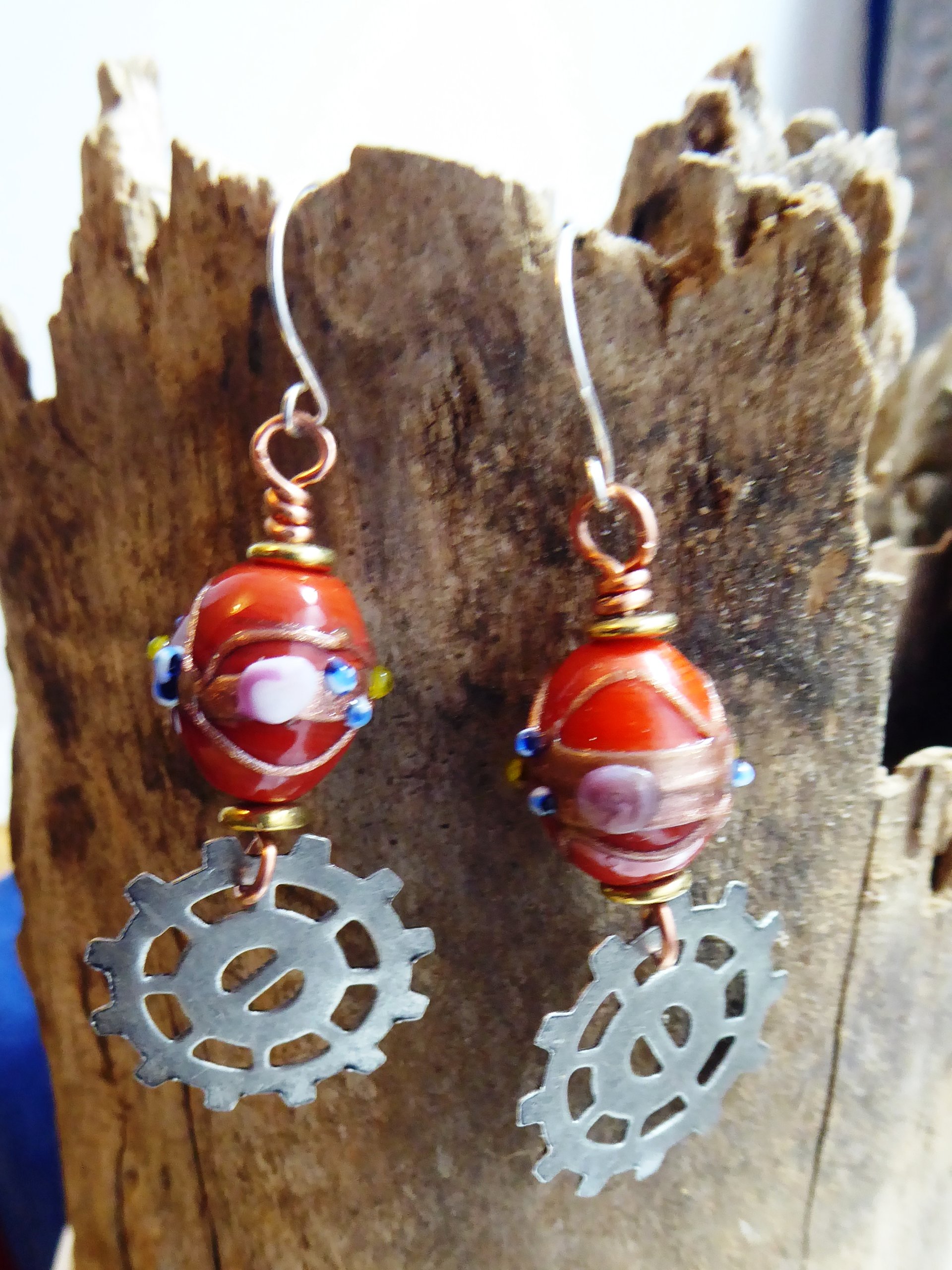 Geared up steampunk orange lampwork dangle earrings