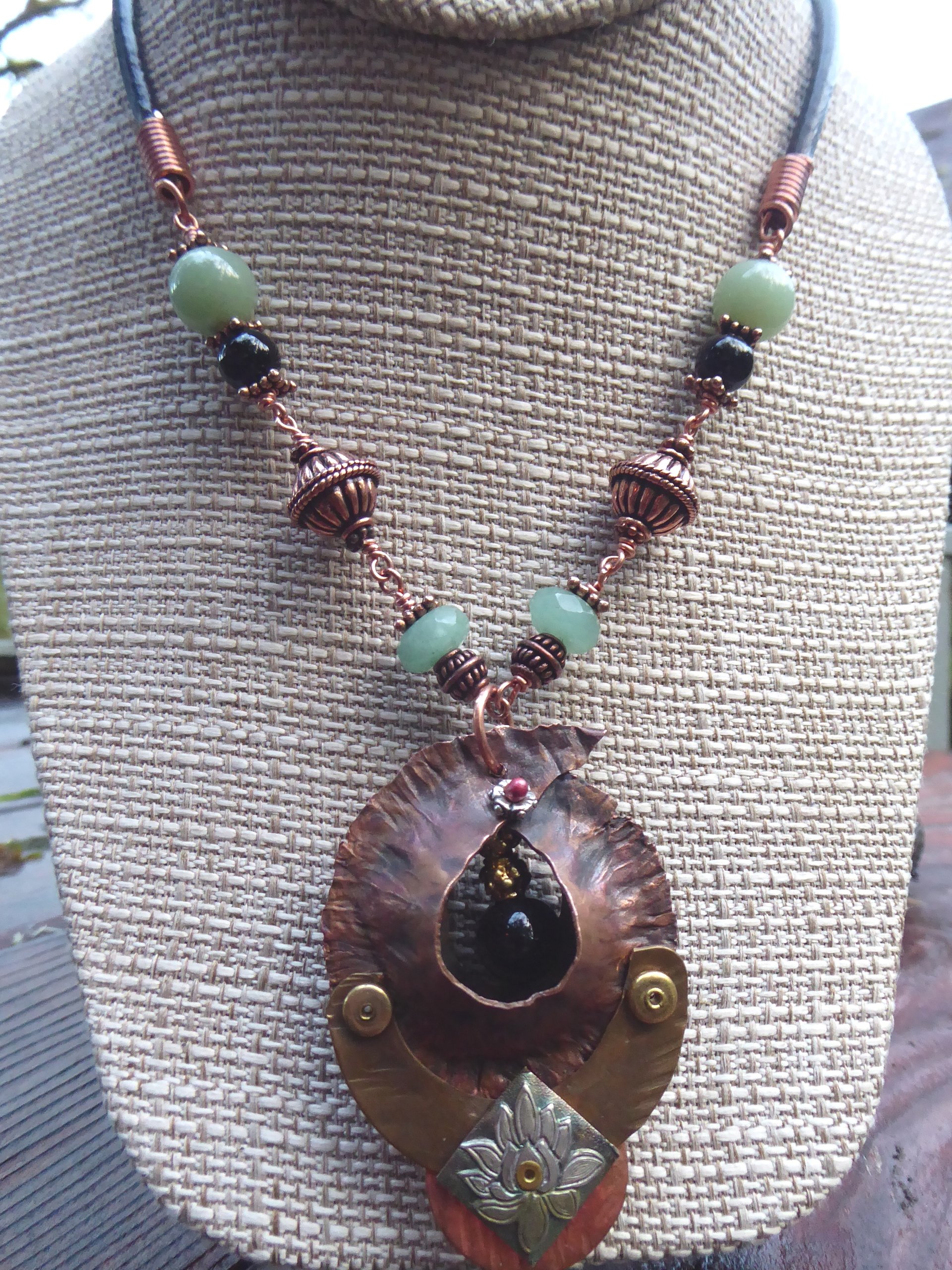 Copper forged fold form mixed metal cocoon pendant with beads