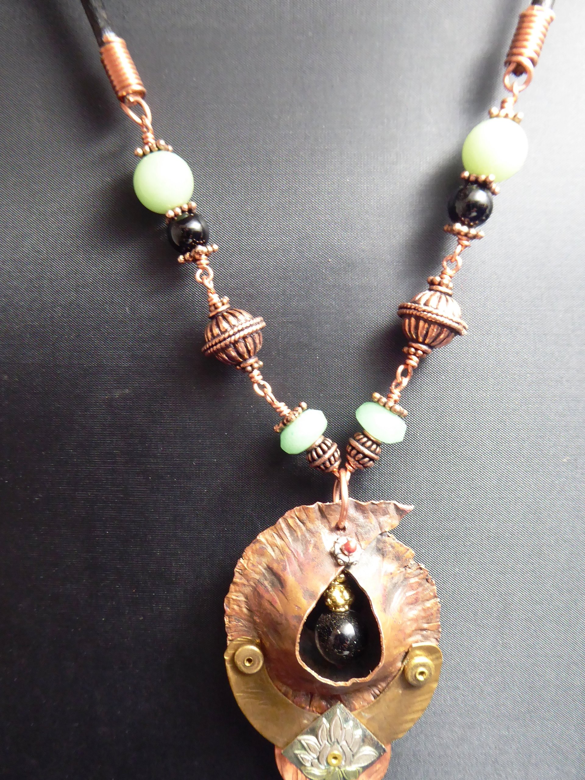Copper forged fold form mixed metal cocoon pendant with beads