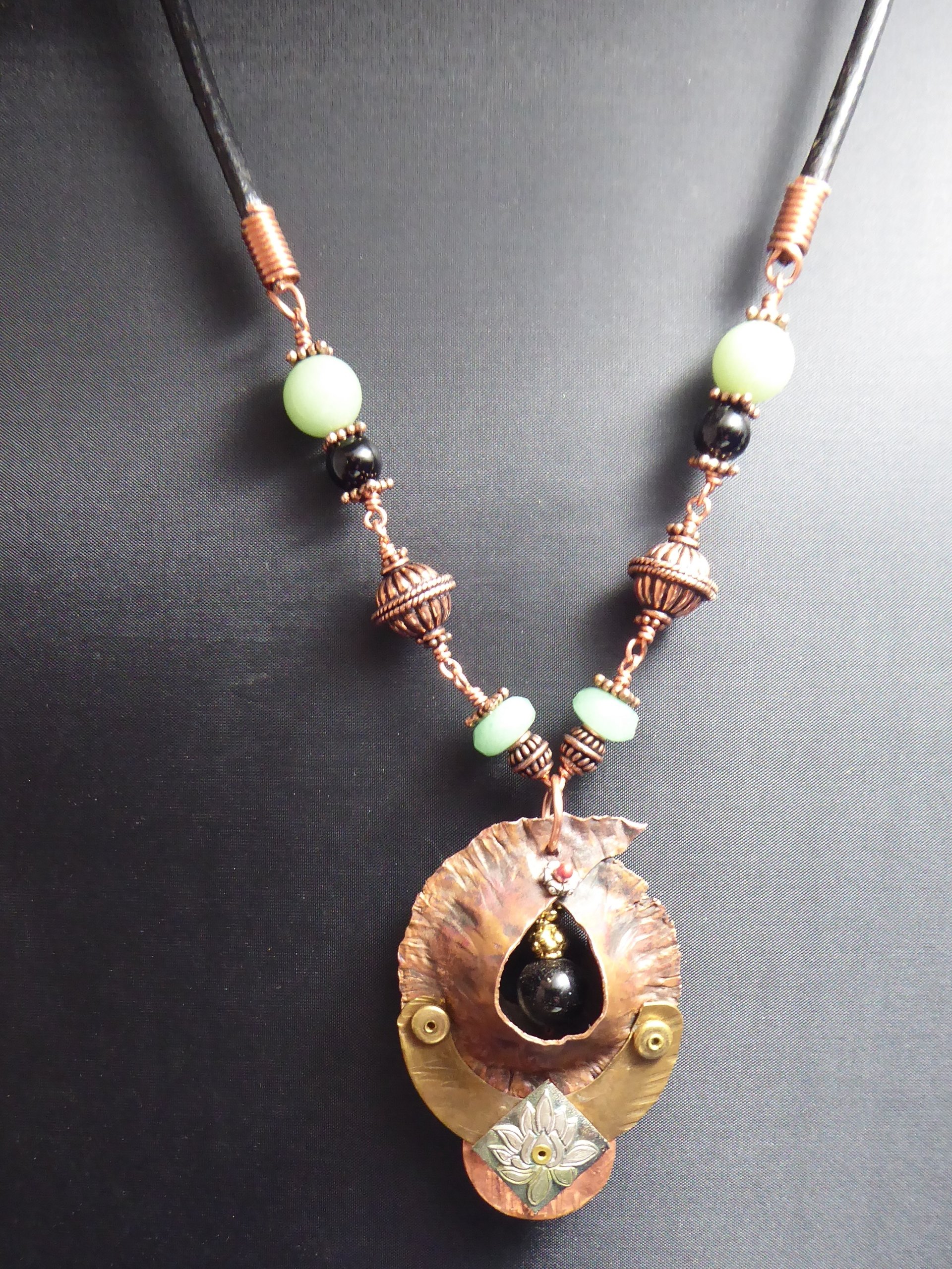 Copper forged fold form mixed metal cocoon pendant with beads