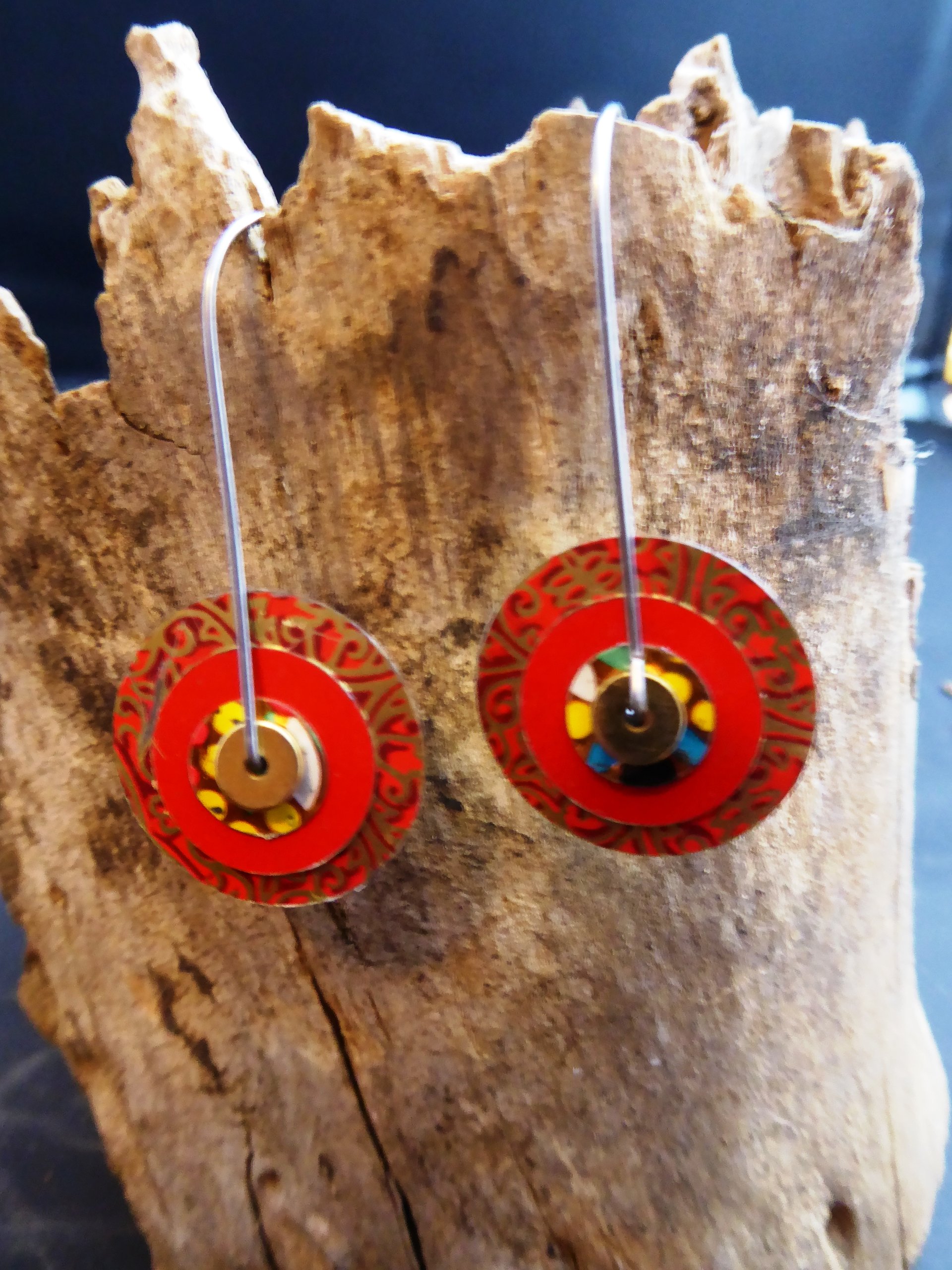 Festive red recycled tin large hoop dangles in a unique design