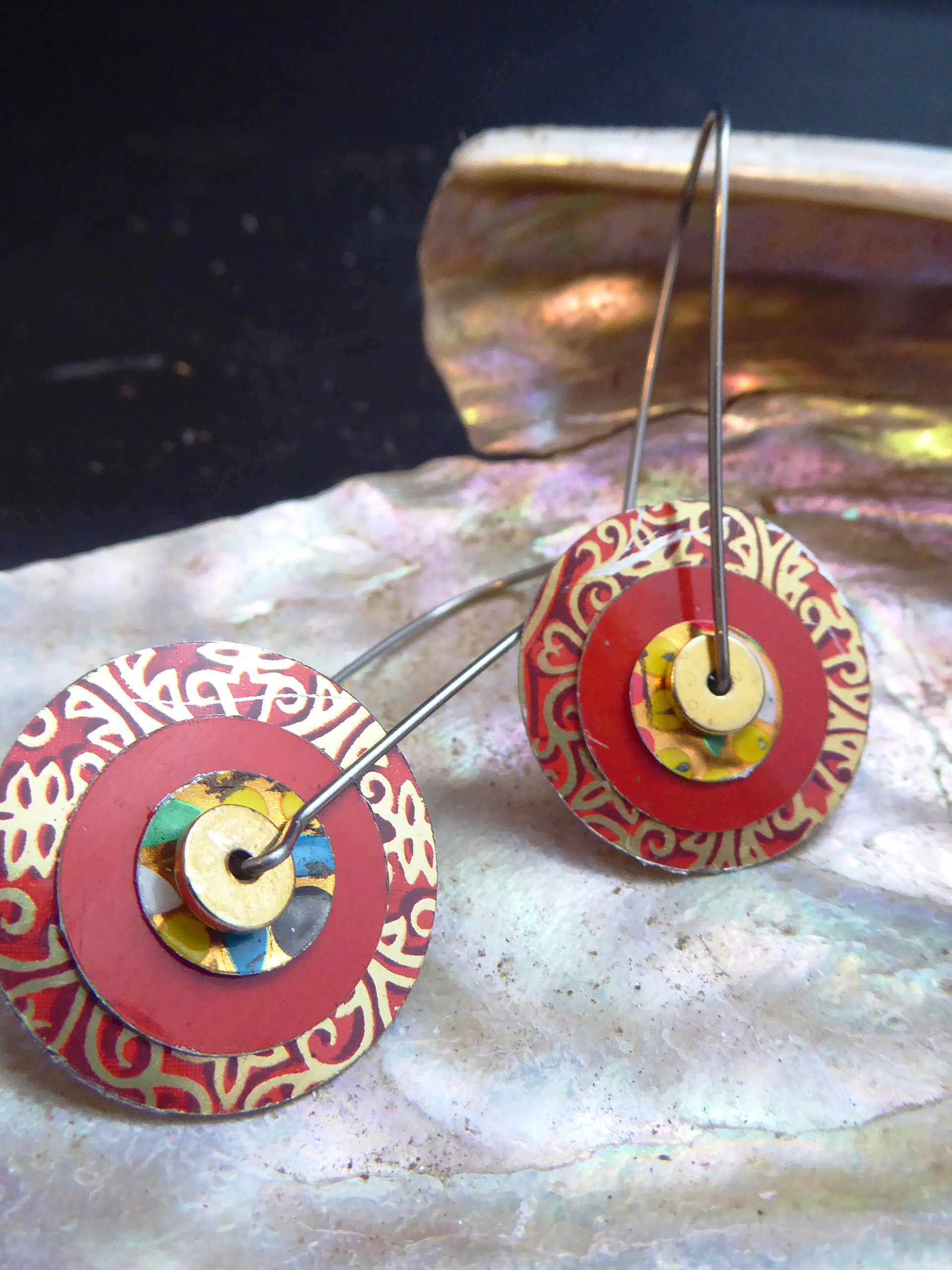 Festive red recycled tin large hoop dangles in a unique design
