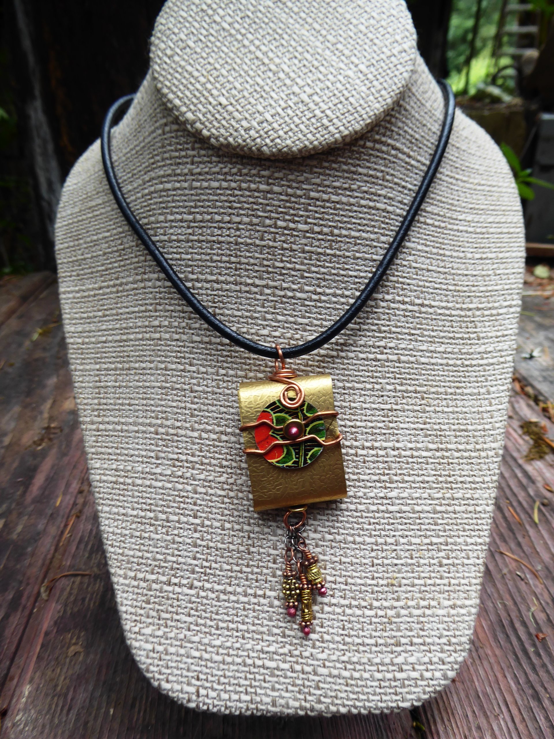 Tibetan inspired prayer pendant in brass with recycled tin word - Trust