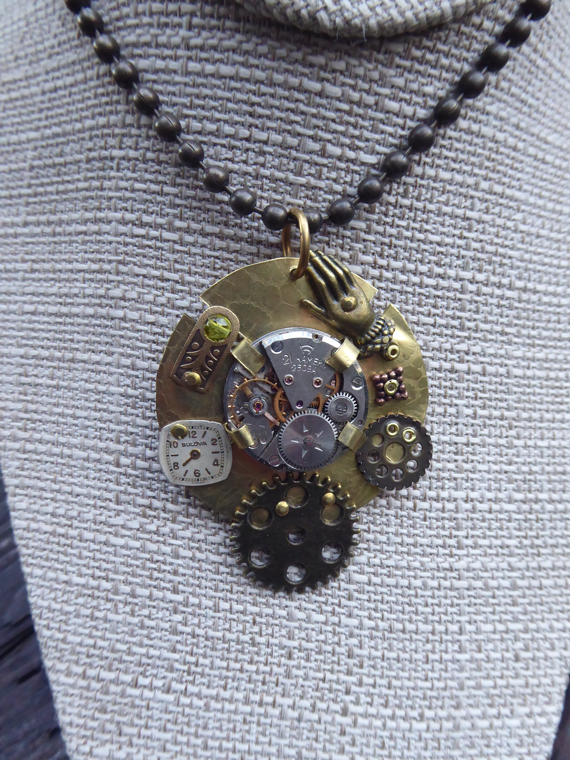 Mixed metal steampunk watchwork gear pendant