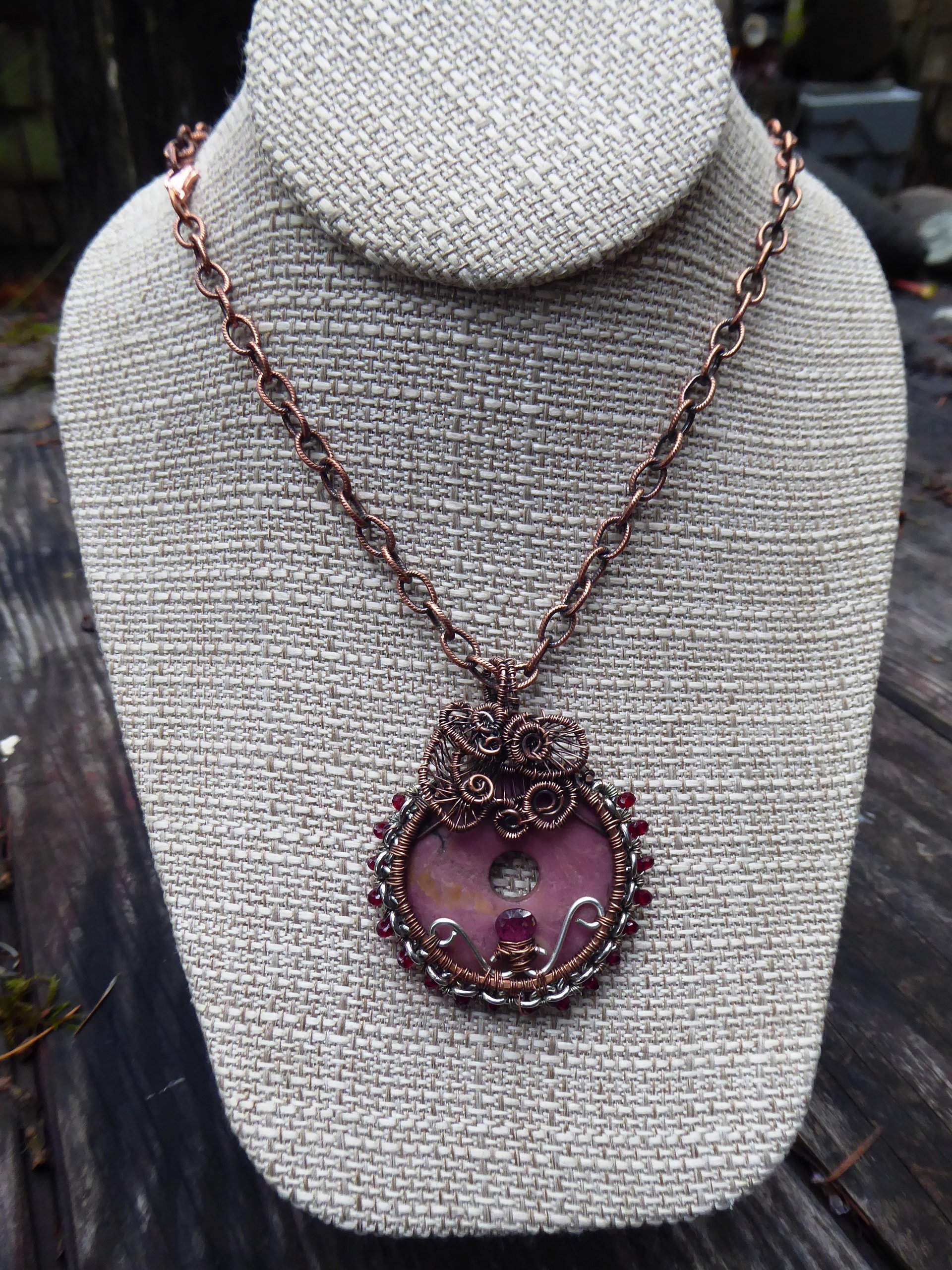 Bold and sassy rhodonite mixed metal donut pendant