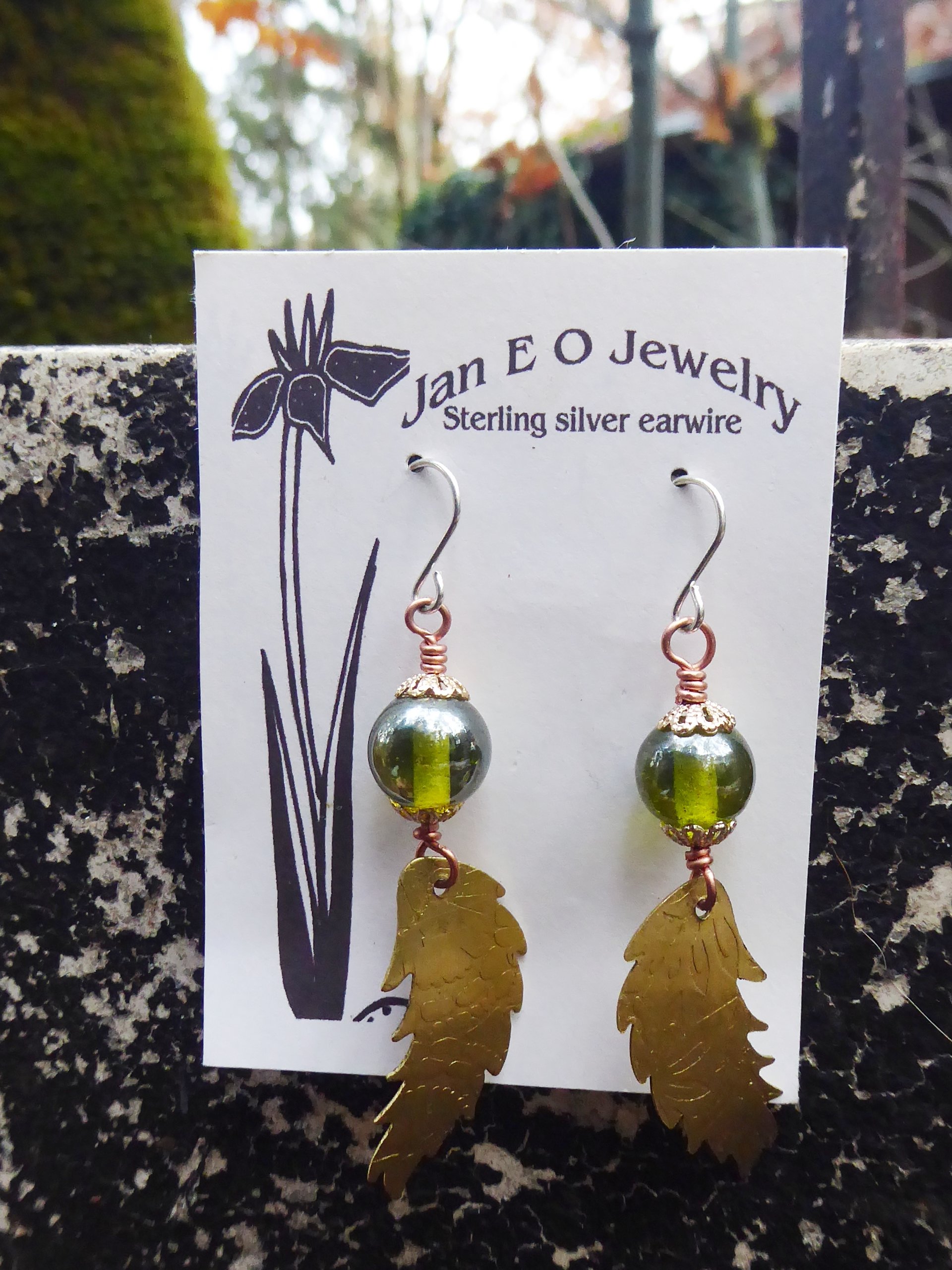 Bead and feather brass dangle earrings