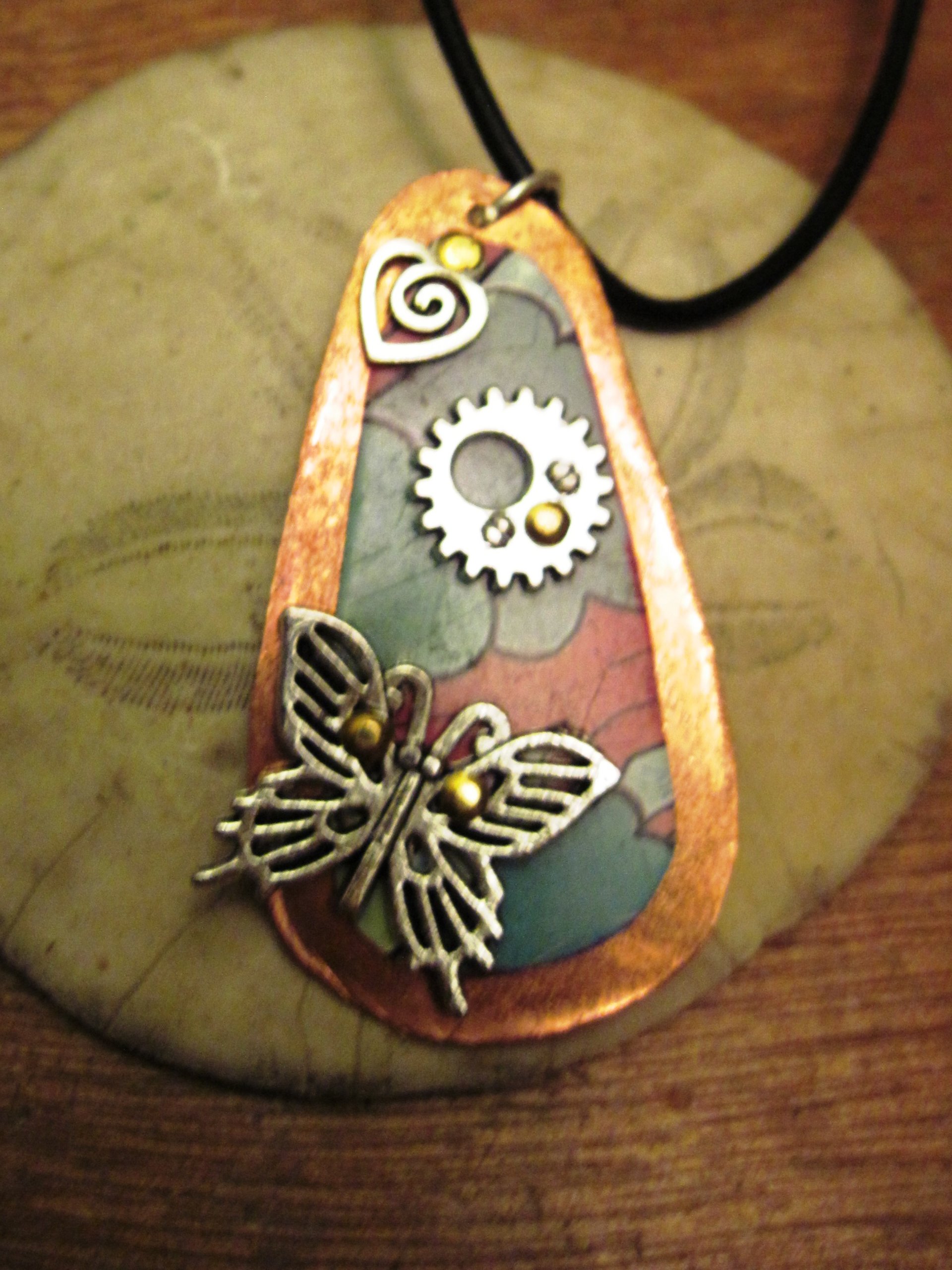 Recycled tin copper pendant with butterfly, gear, heart