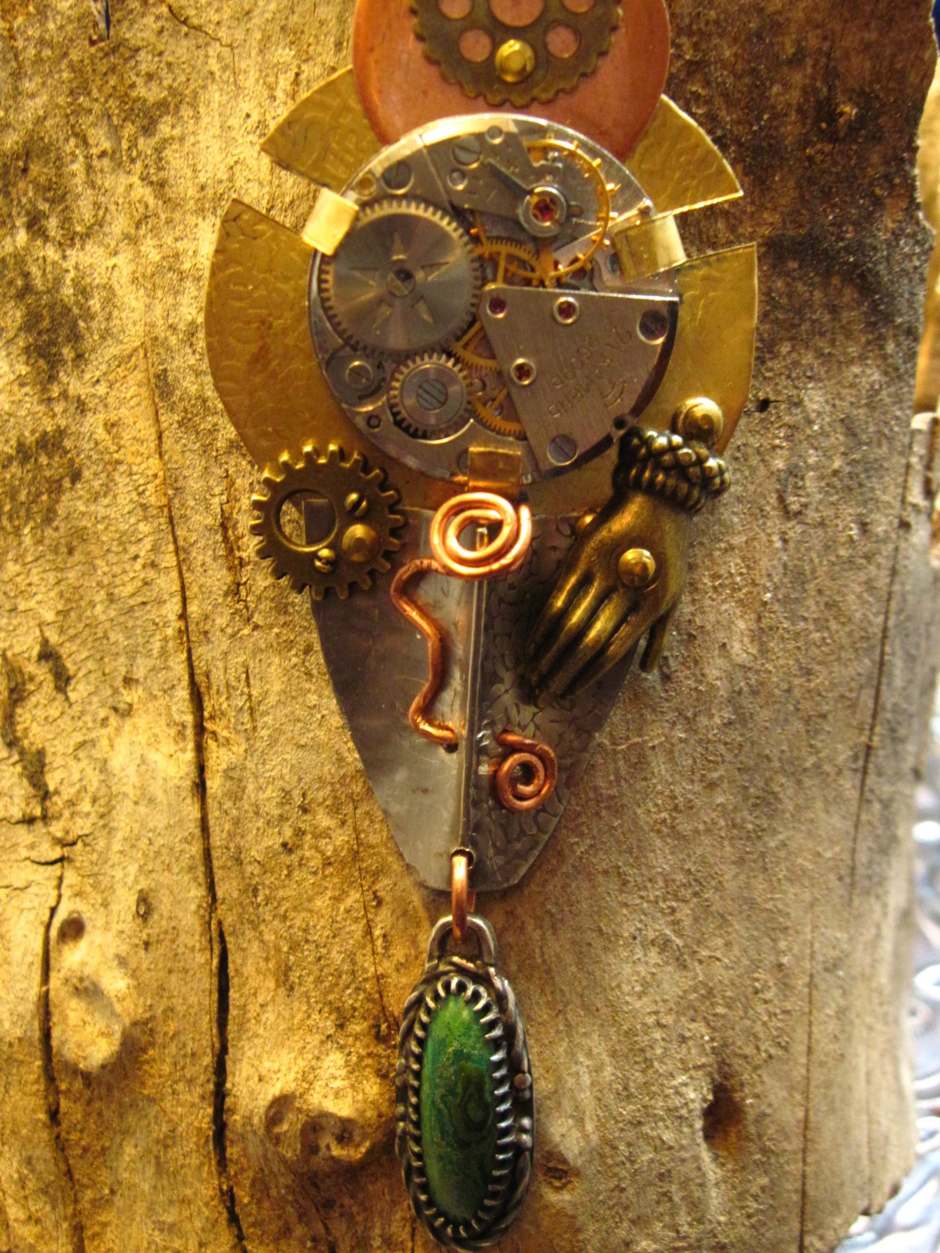 Steampunk mixed metal watchwork gear pendant called Full Steam Ahead