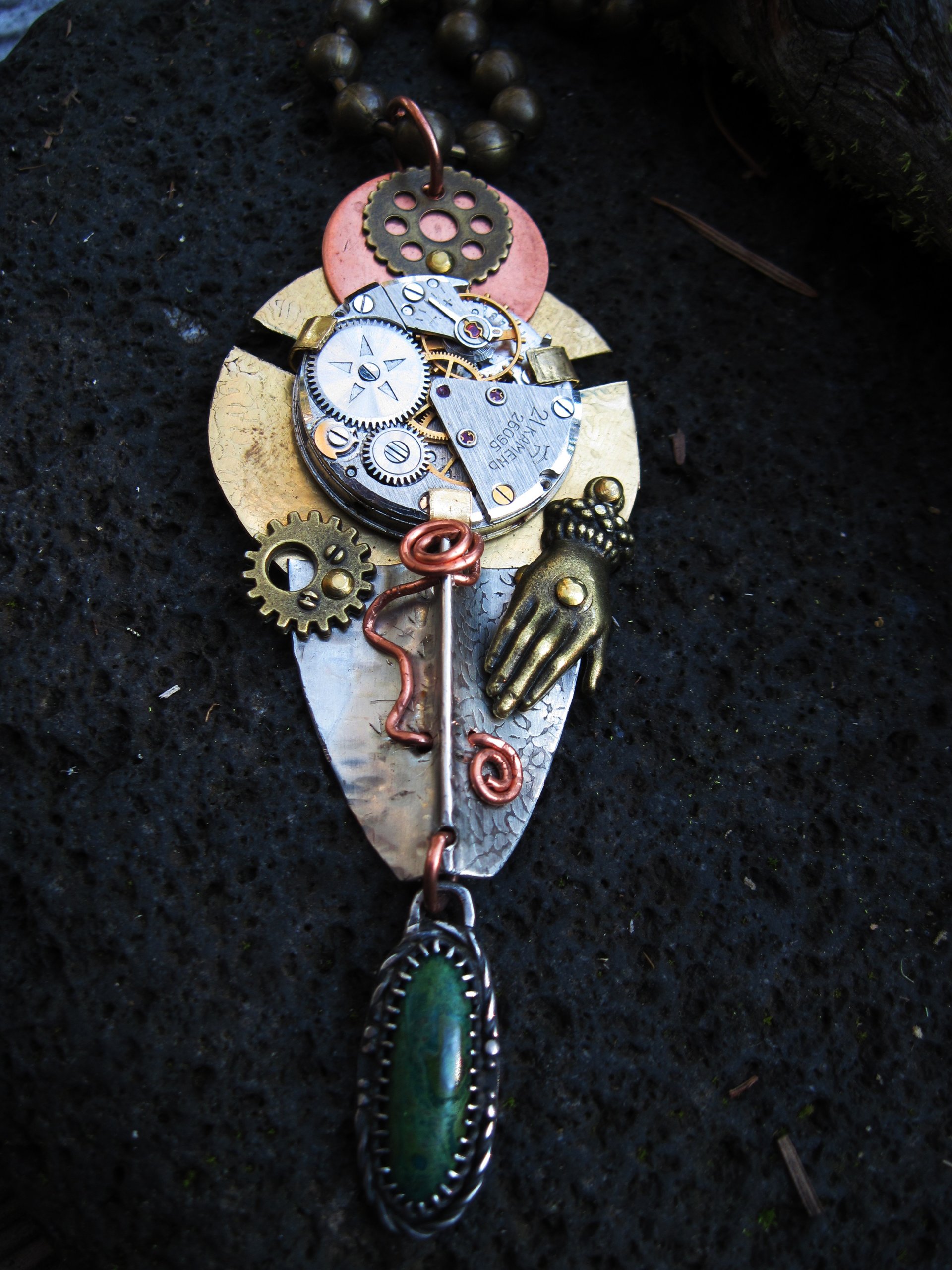 Steampunk mixed metal watchwork gear pendant called Full Steam Ahead