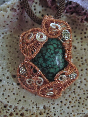 Copper and silver wire woven turquoise pendantCopper and silver wire woven turqu
