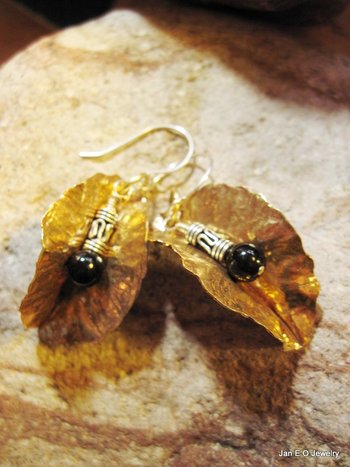 Tribal fold form bronze leaf earrings with sterling and black onyx