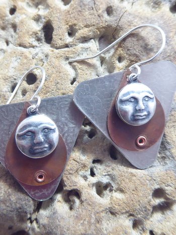 Mixed metal moon face dangle earrings copper and German silver