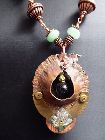 Copper forged fold form mixed metal cocoon pendant with beads