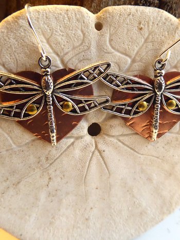 Mixed metal dangle dragonfly earrings with a copper heart
