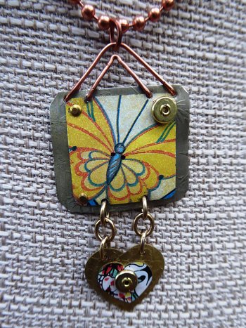 Trashy tin butterfly mixed metal love pendant