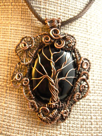 Copper black onyx tree of life with a swirling spirals wire woven pendant one of