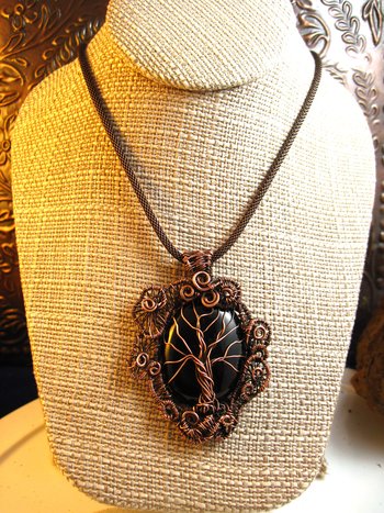 Copper black onyx tree of life with a swirling spirals wire woven pendant one of