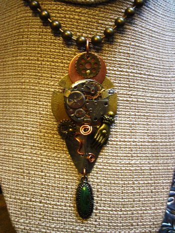 Steampunk mixed metal watchwork gear pendant called Full Steam Ahead